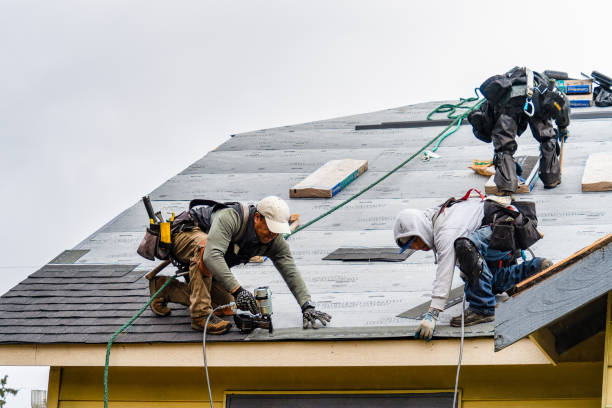 Professional Storm Damage Roof Repair technician working in Hooversville, PA